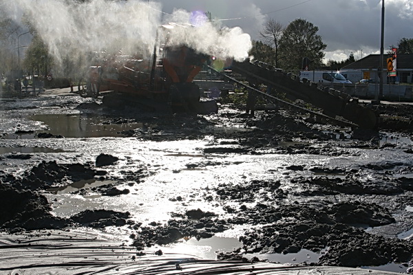 Deze is ook toelaatbaar.... Net alsof de draineermachine in brand staat.... Wolken waterdruppeltjes....